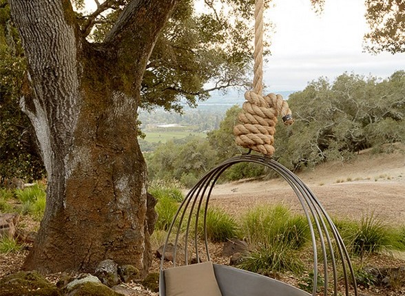 This swing looks like the perfect place to relax!…