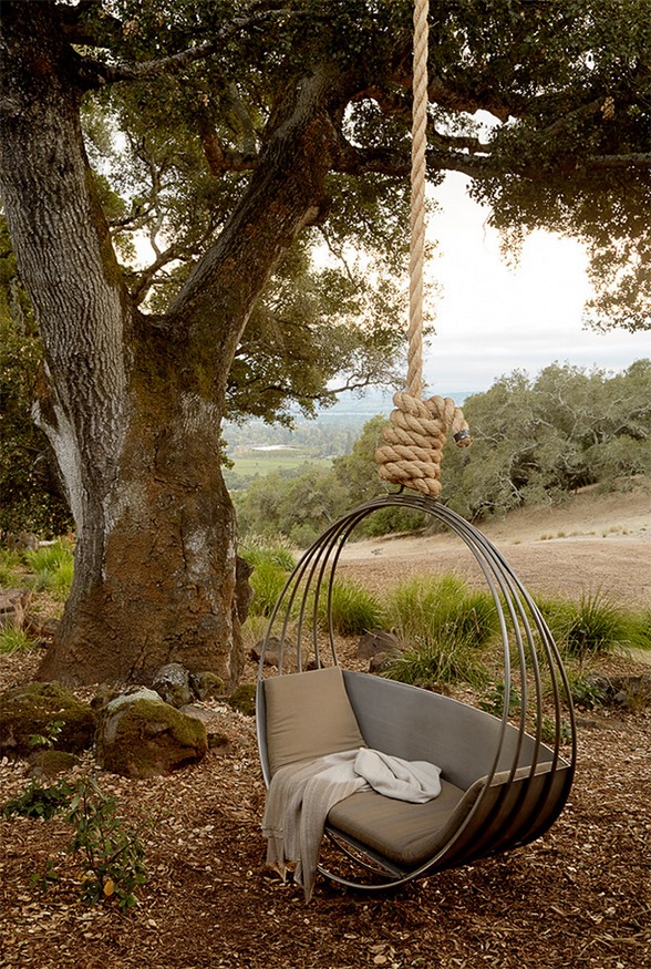 This swing looks like the perfect place to relax!…