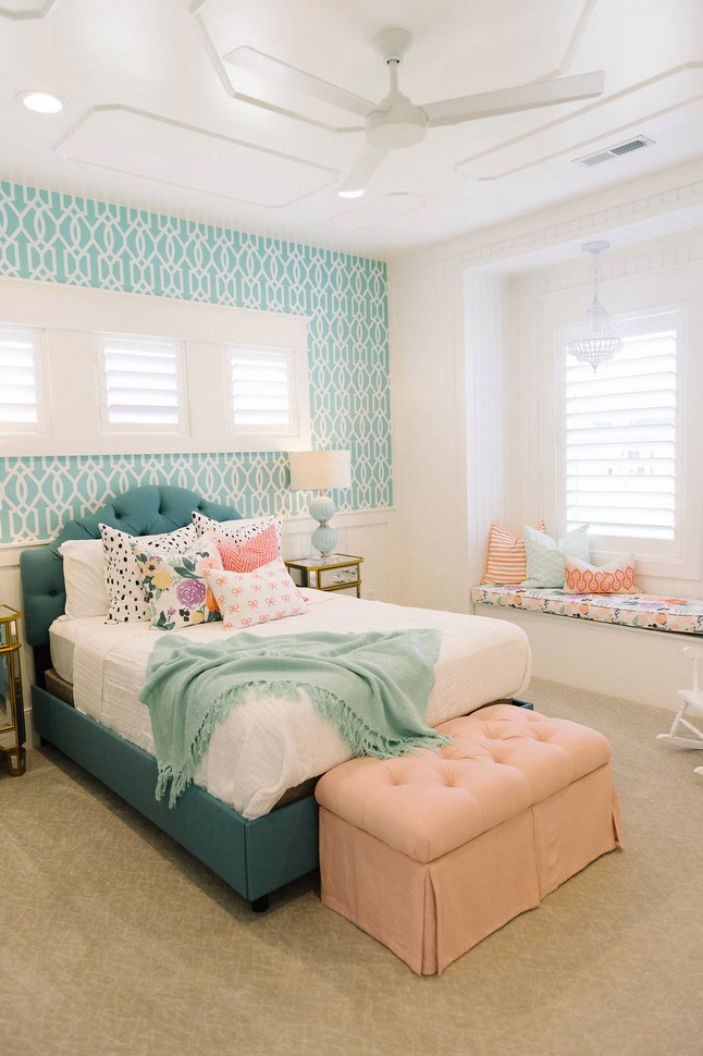 Are you a fan of the colors used in this bedroom? The peach and blue hues compli…