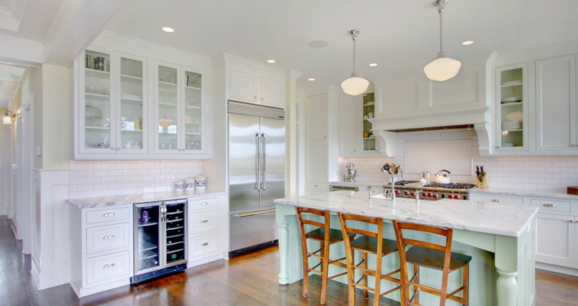 This bright, open kitchen includes little touches of color for a friendly appeal…