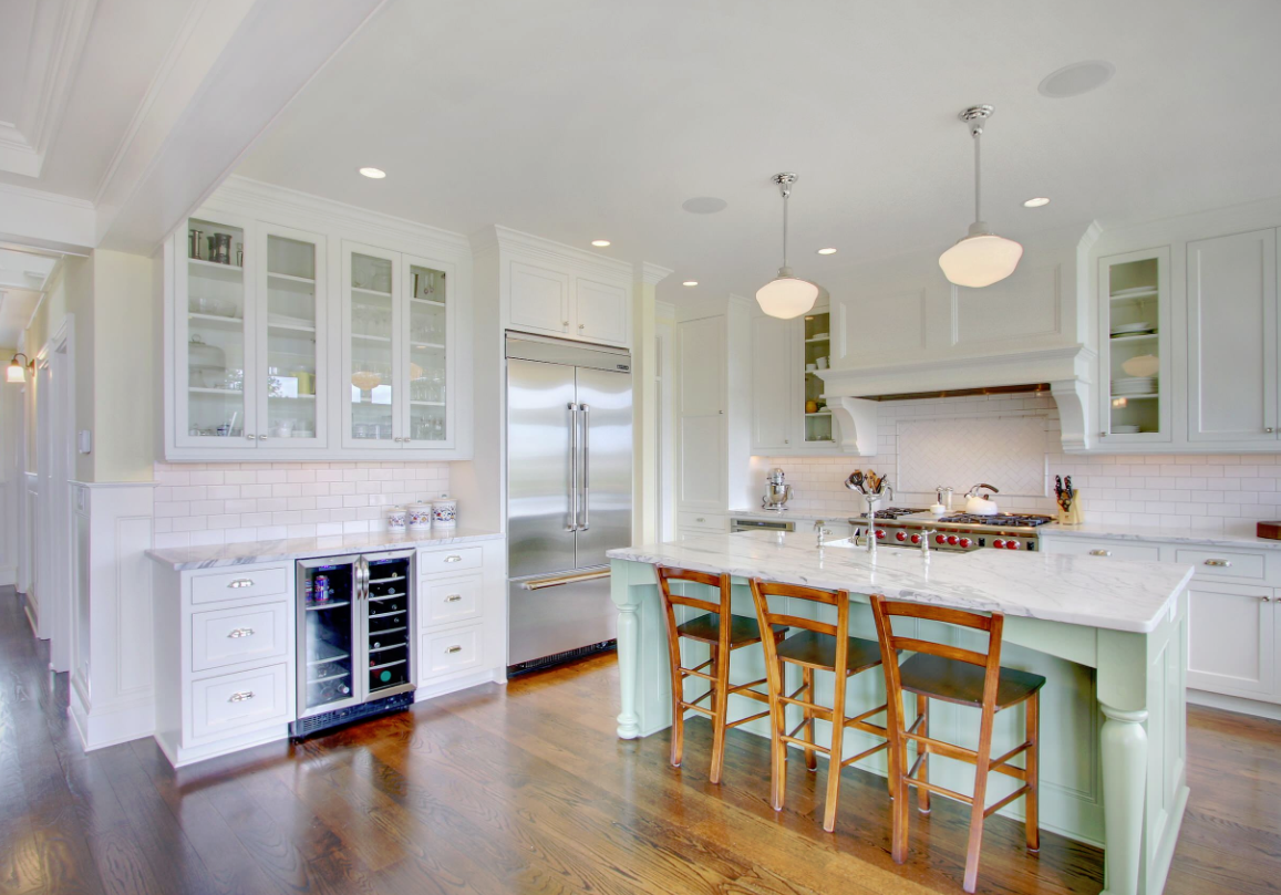 This bright, open kitchen includes little touches of color for a friendly appeal…