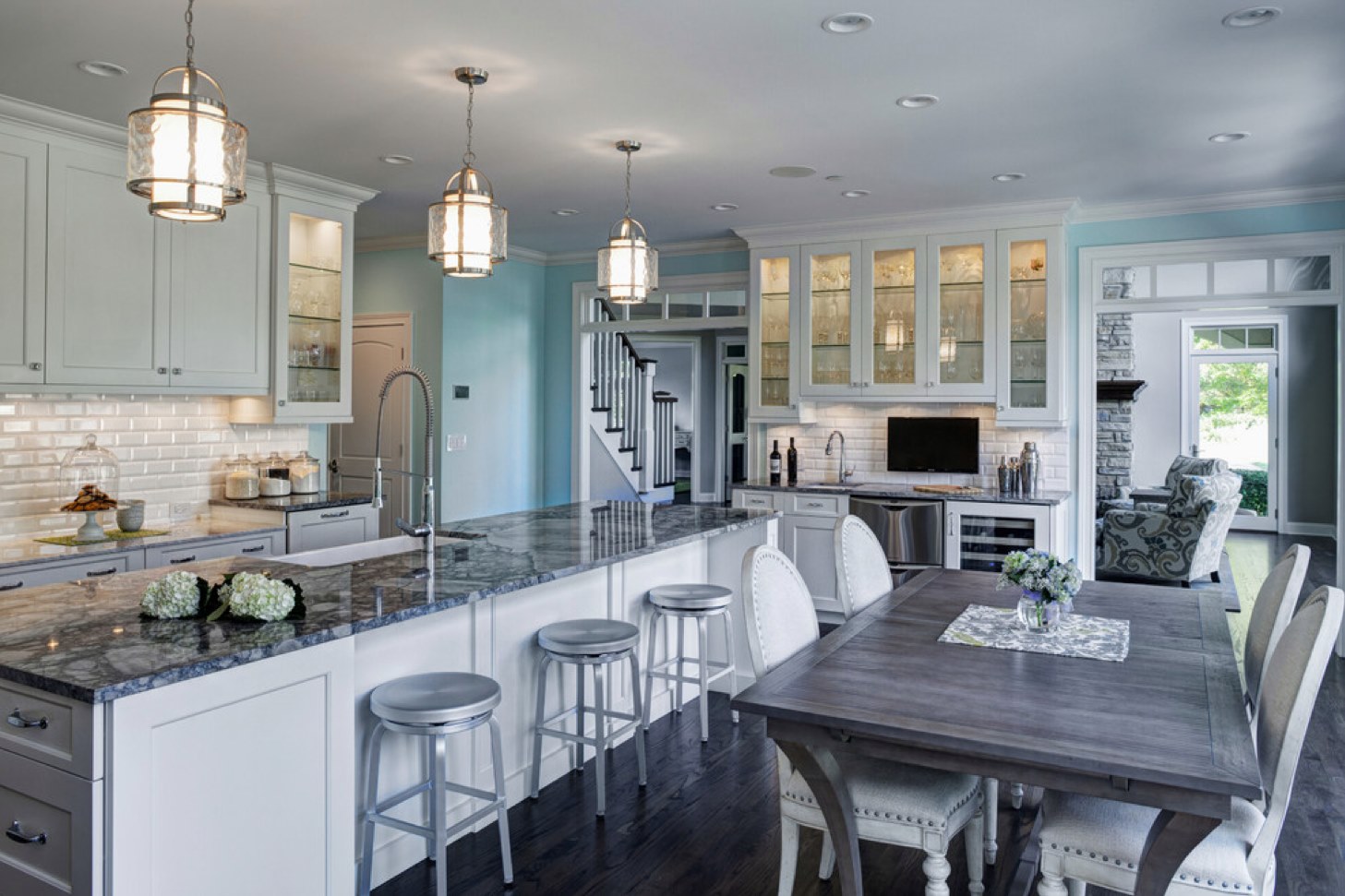 Do you like the color combination of whites, grays and blues in this kitchen?…