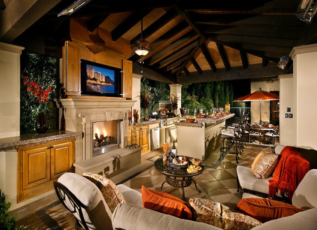 What do you like best about this outdoor kitchen and entertainment space?…