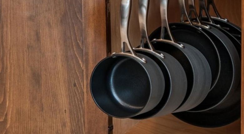 This sliding hanger keeps all of your pots and pans organized, plus stores them …