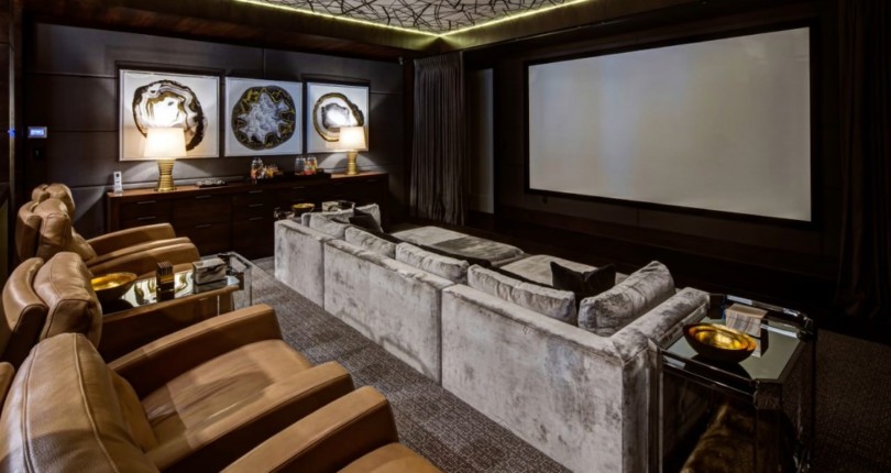 Wouldn’t you love to host movie night at this plush and comfy home theater?…