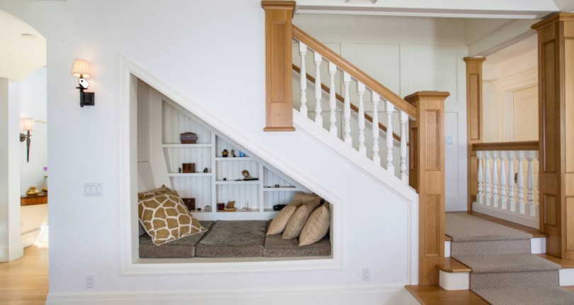 The owners of this home used the space under their stairs to add a napping nook …