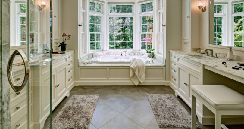 Are you a fan of this elegant master bathroom? We love how HUGE it is! You’d nev…