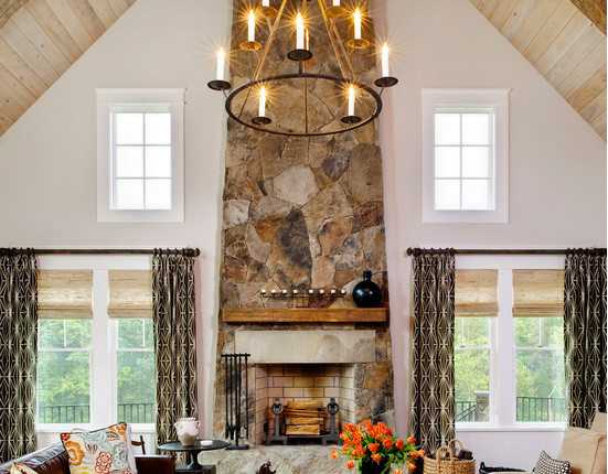 The vaulted ceiling in this living area makes the room look bright and inviting!…