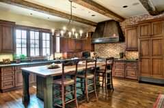 If you’re a fan of darker kitchens with some rustic charm, you might LOVE this d…