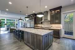 The MASSIVE island in this kitchen would make this house THE place for entertain…